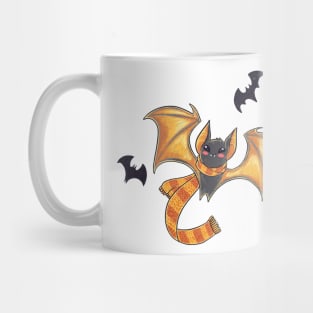 Cozy bat with a scarf and spooky friends on Halloween Mug